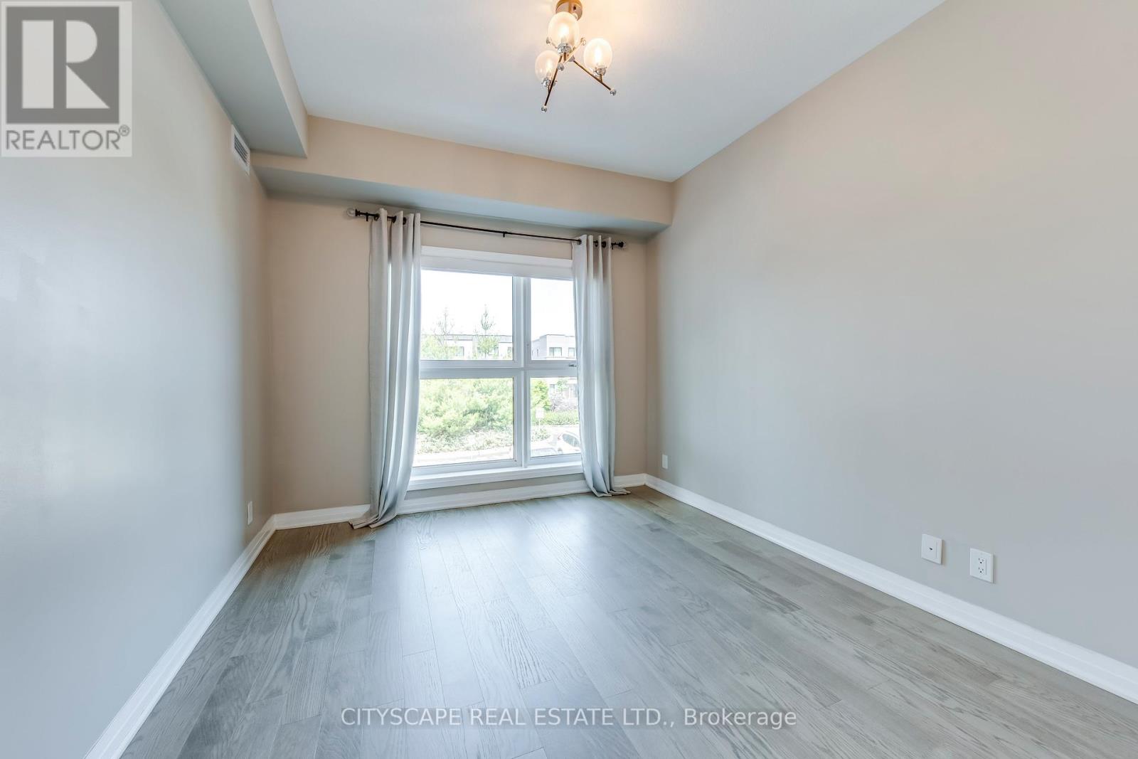 205 - 128 Grovewood Common, Oakville, Ontario  L6H 0X3 - Photo 7 - W12513644