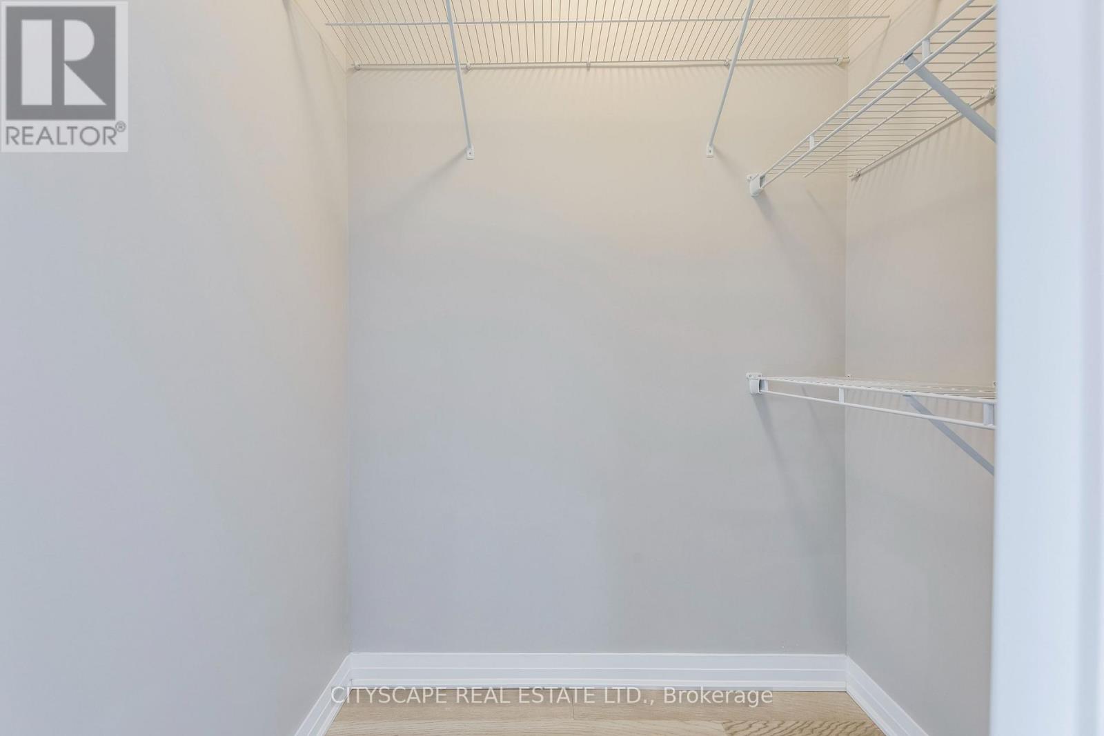 205 - 128 Grovewood Common, Oakville, Ontario  L6H 0X3 - Photo 9 - W12513644