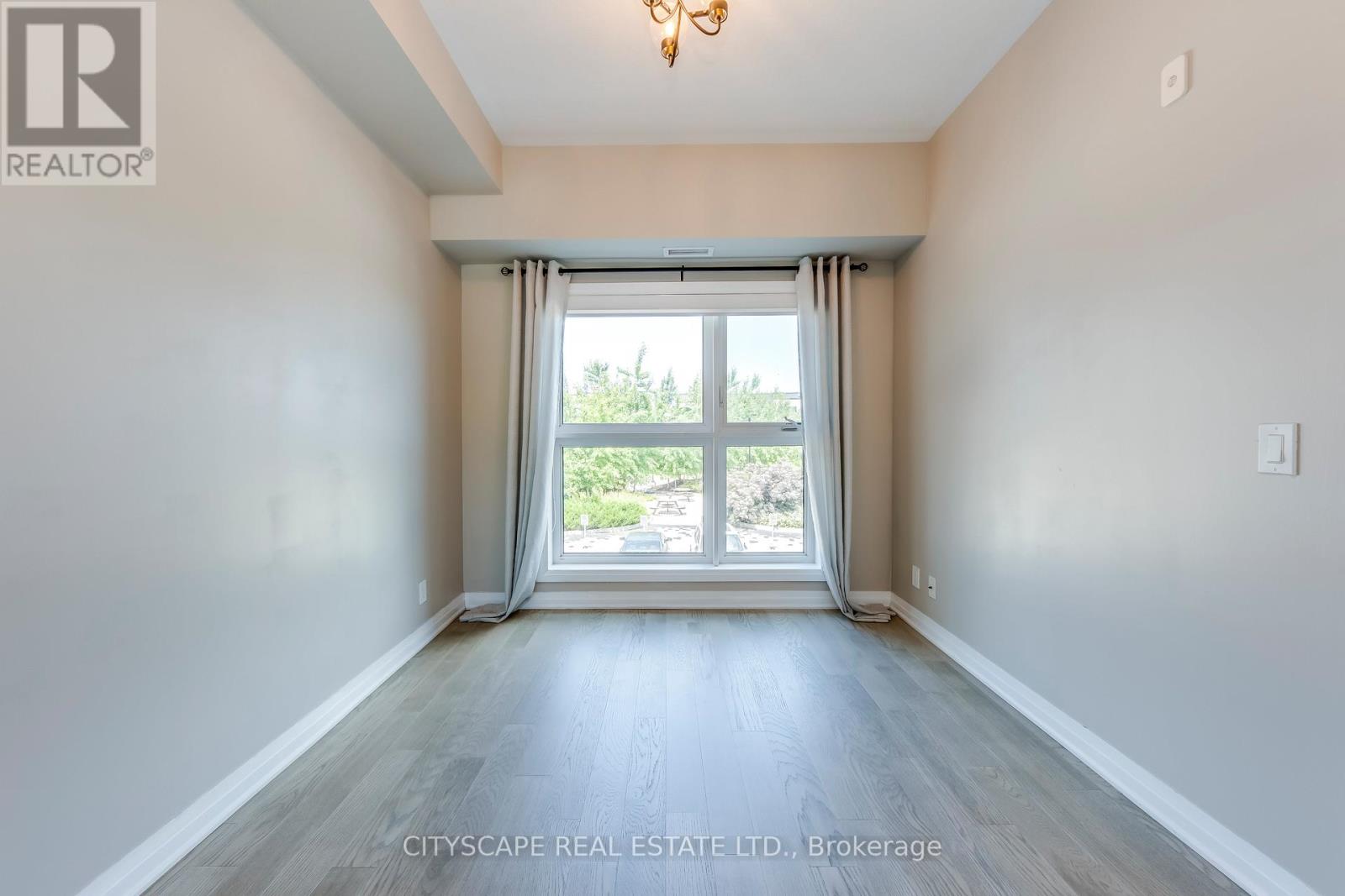 205 - 128 Grovewood Common, Oakville, Ontario  L6H 0X3 - Photo 11 - W12513654