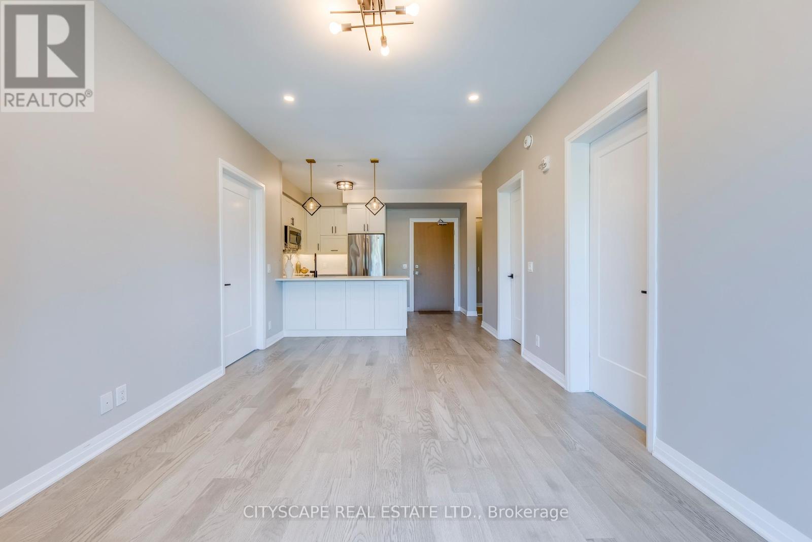 205 - 128 Grovewood Common, Oakville, Ontario  L6H 0X3 - Photo 5 - W12513654