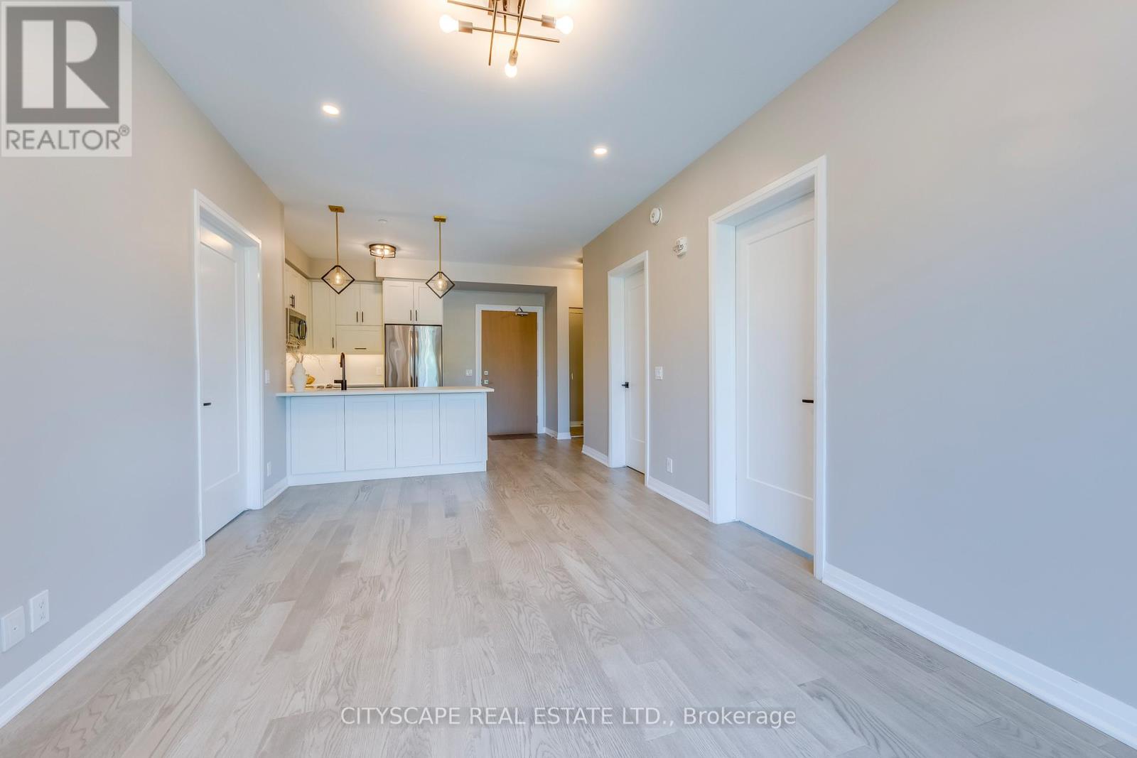 205 - 128 Grovewood Common, Oakville, Ontario  L6H 0X3 - Photo 6 - W12513654