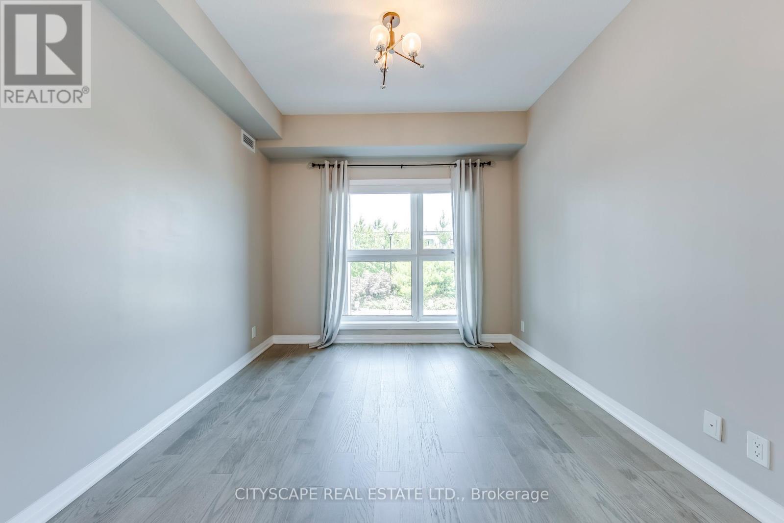 205 - 128 Grovewood Common, Oakville, Ontario  L6H 0X3 - Photo 8 - W12513654