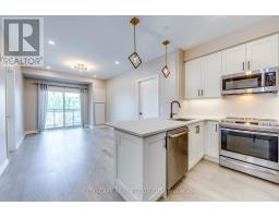 205 - 128 GROVEWOOD COMMON, Oakville, Ontario