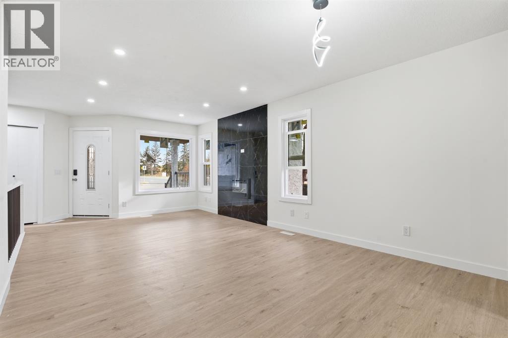 5 Del Monica Bay Ne, Calgary, Alberta  T1Y 6R2 - Photo 7 - A2267947