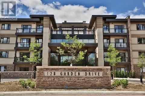 423 - 128 Garden Drive, Oakville, Ontario  L6K 2W5 - Photo 1 - W12514754
