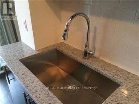 423 - 128 Garden Drive, Oakville, Ontario  L6K 2W5 - Photo 3 - W12514754