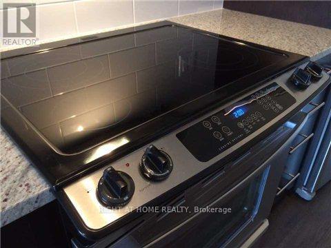 423 - 128 Garden Drive, Oakville, Ontario  L6K 2W5 - Photo 4 - W12514754