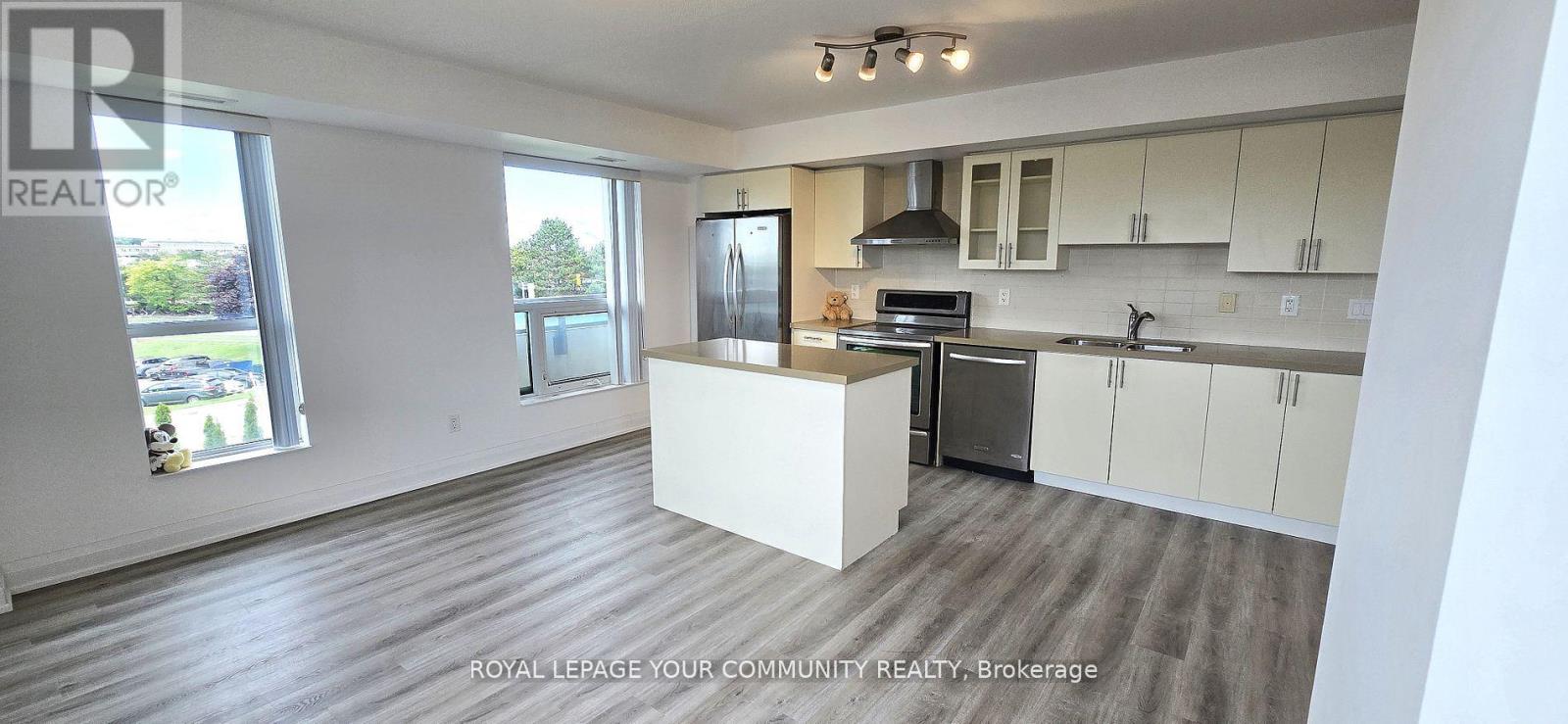 317 - 75 Norman Bethune Avenue, Richmond Hill, Ontario  L4B 0B6 - Photo 2 - N12514826