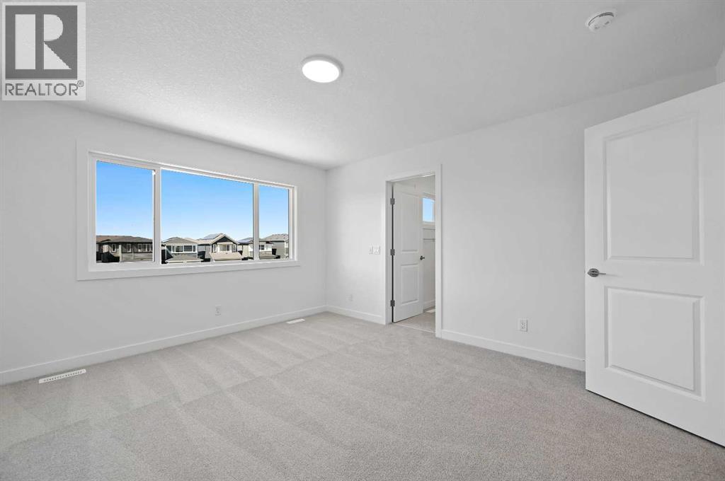 63 Corner Glen Common Ne, Calgary, Alberta  T3N 2L9 - Photo 8 - A2252602