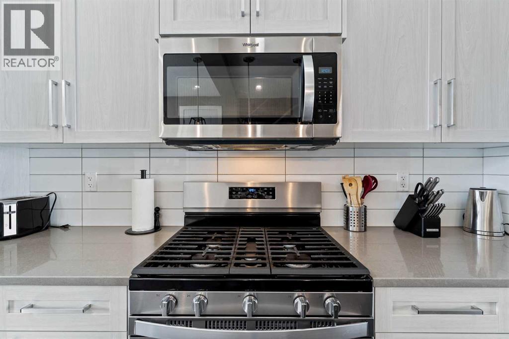 7 Cooperswood Court Sw, Airdrie, Alberta  T4B 5E9 - Photo 6 - A2262699