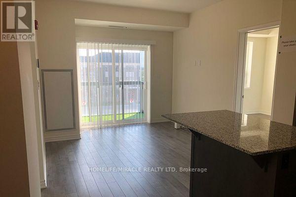 303 - 200 Lagerfeld Drive, Brampton, Ontario  L7A 5G5 - Photo 2 - W12515266