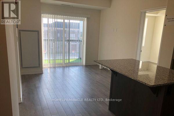 303 - 200 Lagerfeld Drive, Brampton, Ontario  L7A 5G5 - Photo 4 - W12515266