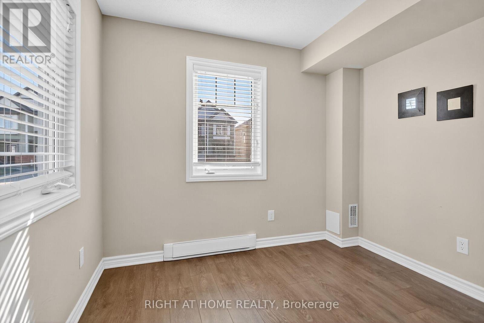 91 Buffalograss Crescent, Ottawa, Ontario  K2J 6H5 - Photo 4 - X12515714