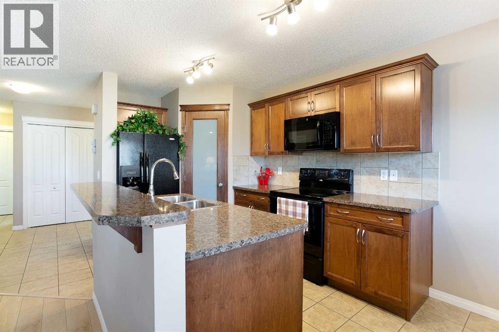 28 Kinlea Link Nw, Calgary, Alberta  T3R 0C4 - Photo 6 - A2267395