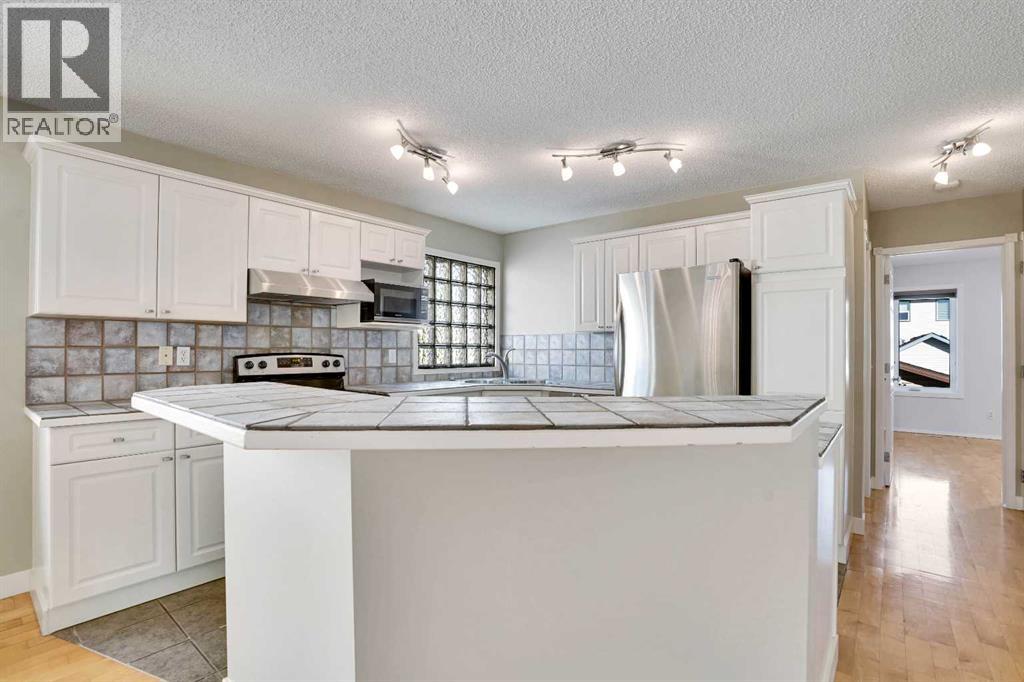 307 Arbour Grove Close Nw, Calgary, Alberta  T3G 4J3 - Photo 12 - A2257219