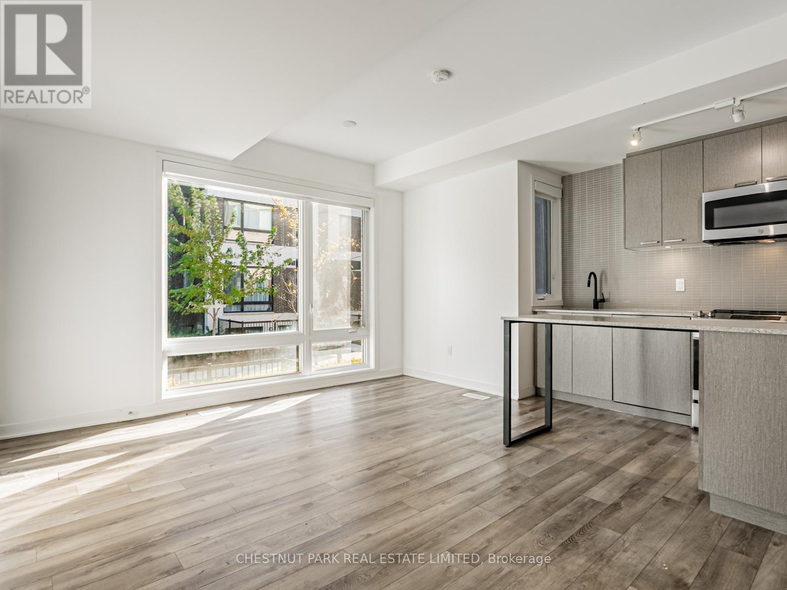 Th4 - 30 Ed Clark Gardens, Toronto (Weston-Pellam Park), Ontario  M6N 0B5 - Photo 5 - W12517024