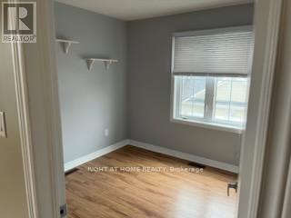 Coach House - 7 Ivy Stone Court, Markham, Ontario  L6B 1H6 - Photo 7 - N12517128