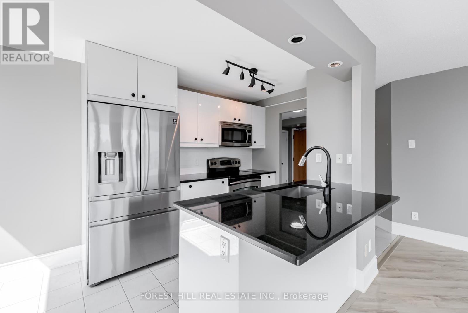 410 - 75 Ellen Street, Barrie, Ontario  L4N 7R6 - Photo 11 - S12517126