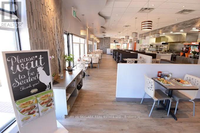 280 North Service Road W, Oakville, Ontario  L6M 3E6 - Photo 2 - W12517056