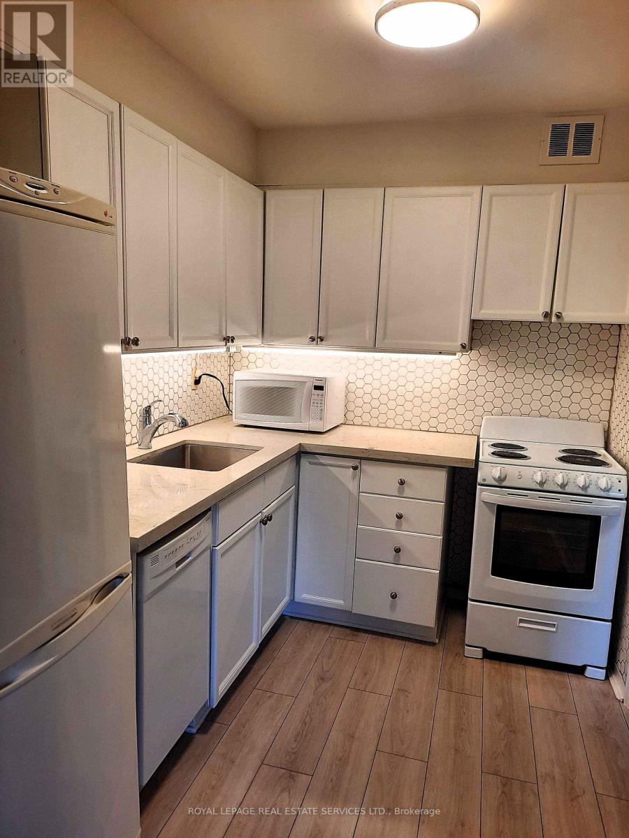 215 - 100 Coe Hill Drive, Toronto, Ontario  M6S 3E1 - Photo 4 - W12517474