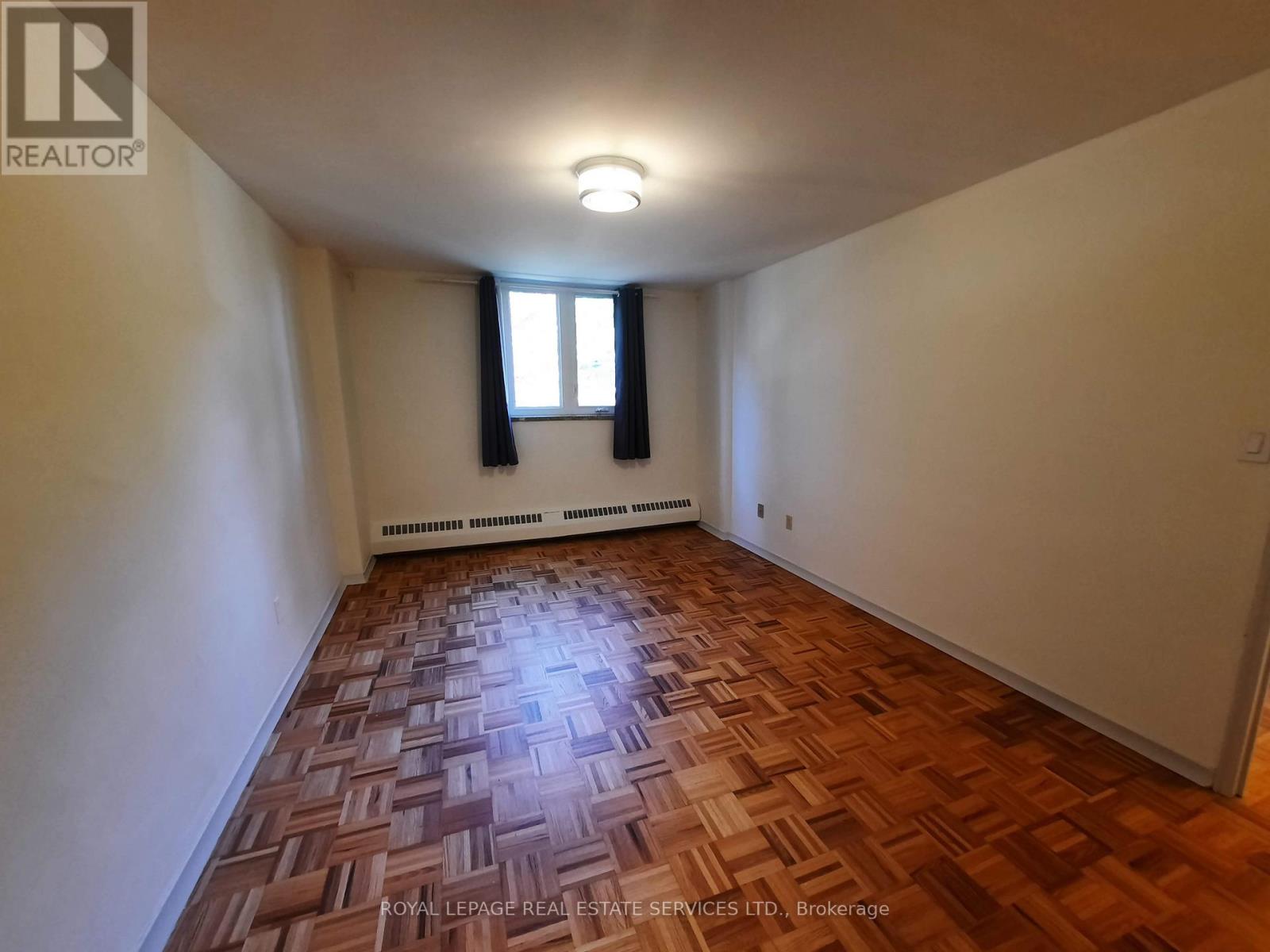 215 - 100 Coe Hill Drive, Toronto, Ontario  M6S 3E1 - Photo 8 - W12517474