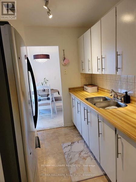 309 - 2485 Woking Crescent, Mississauga, Ontario  L5K 1Z6 - Photo 4 - W12445910