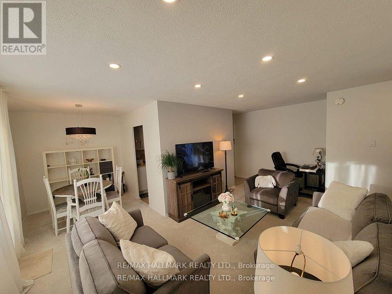 309 - 2485 Woking Crescent, Mississauga, Ontario  L5K 1Z6 - Photo 2 - W12445910