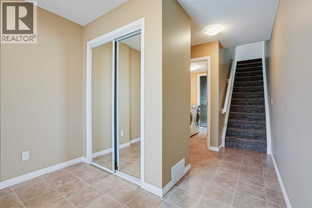 145 Windstone Avenue Sw, Airdrie, Alberta  T4B 3R3 - Photo 3 - A2262743