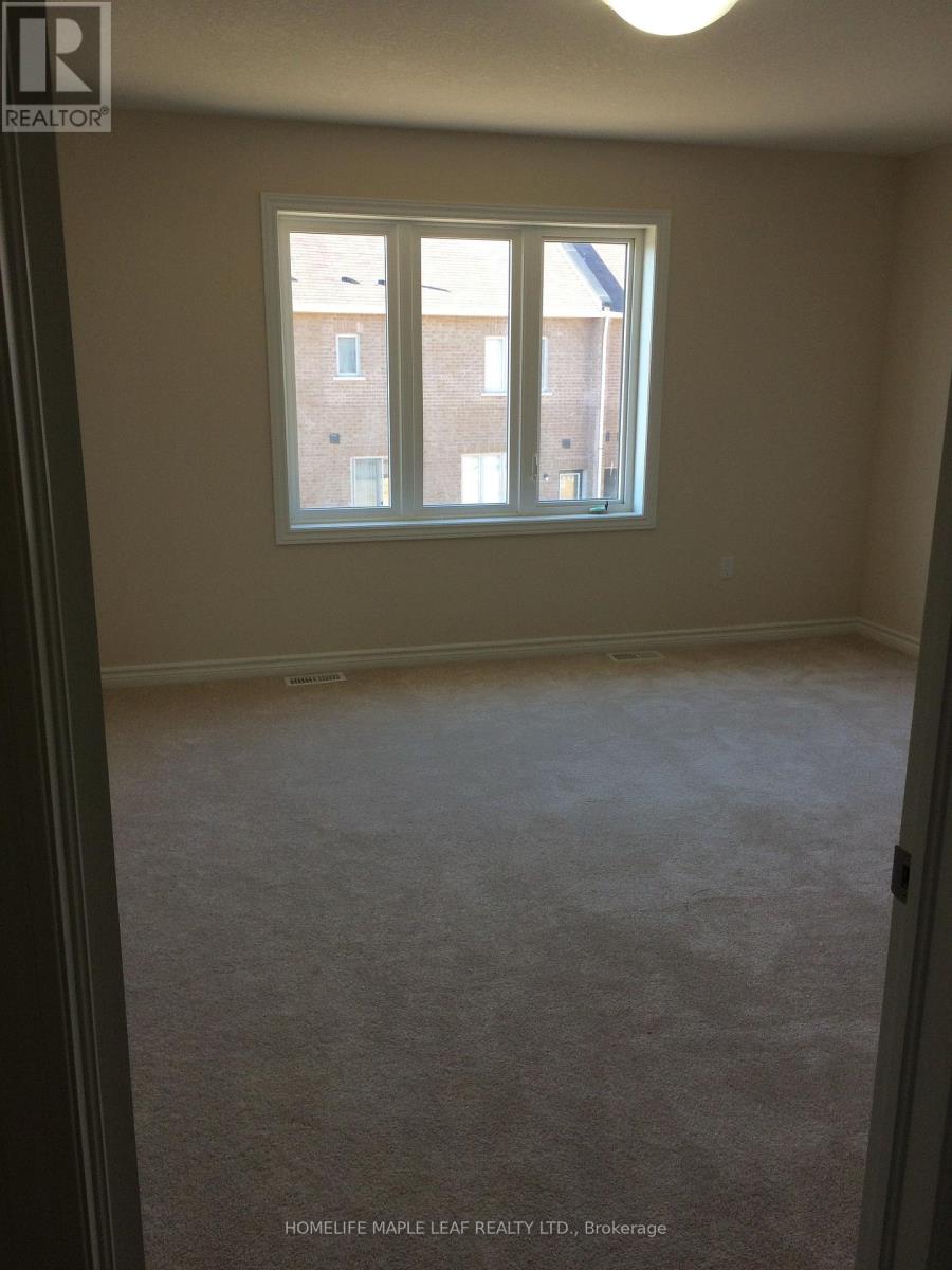 14 Cohoe Street, Brampton, Ontario  L7A 4X8 - Photo 6 - W12517744