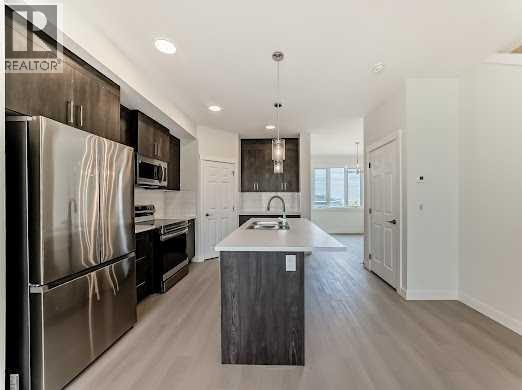 1921 Mccaskill Drive, Crossfield, Alberta  T0M 0S0 - Photo 10 - A2258179