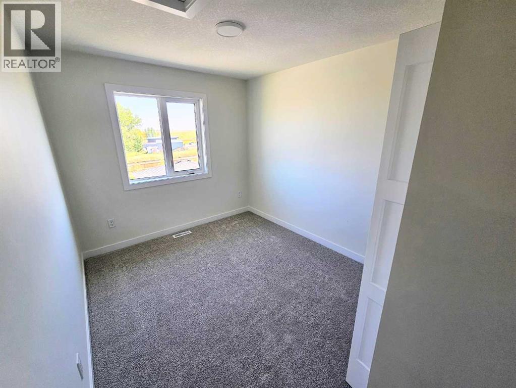 1923 Mccaskill Drive, Crossfield, Alberta  T0M 0S0 - Photo 30 - A2258183