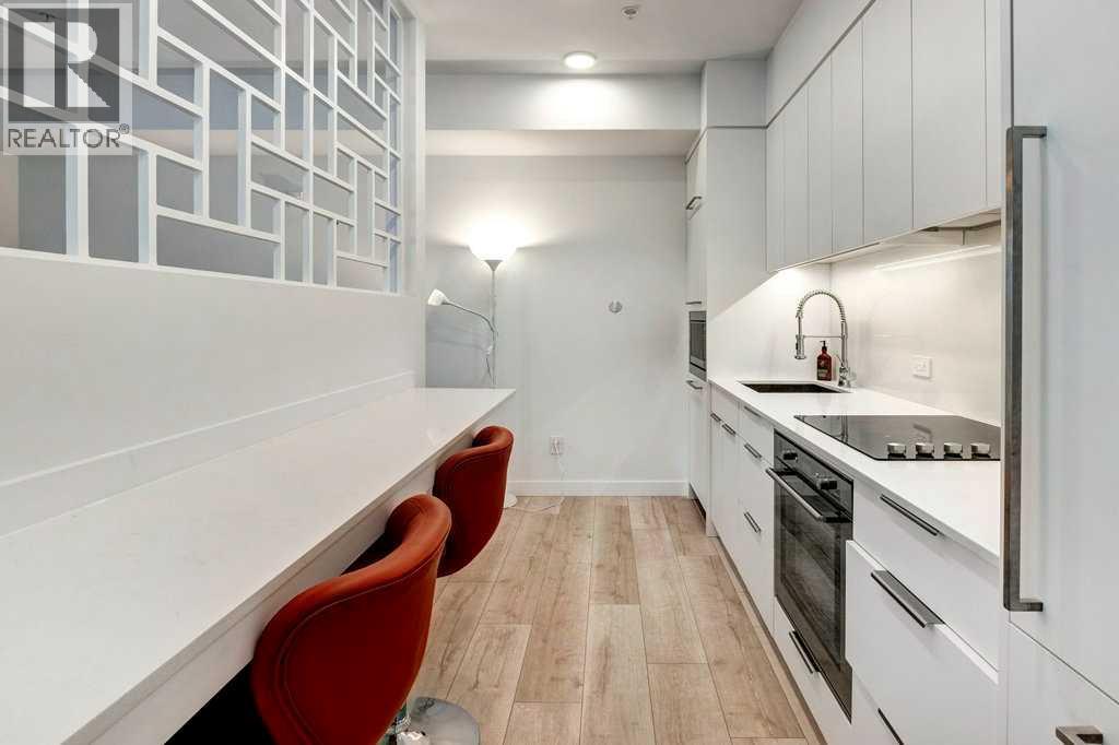 206, 3130 Thirsk Street Nw, Calgary, Alberta  T3B 6H4 - Photo 5 - A2256926