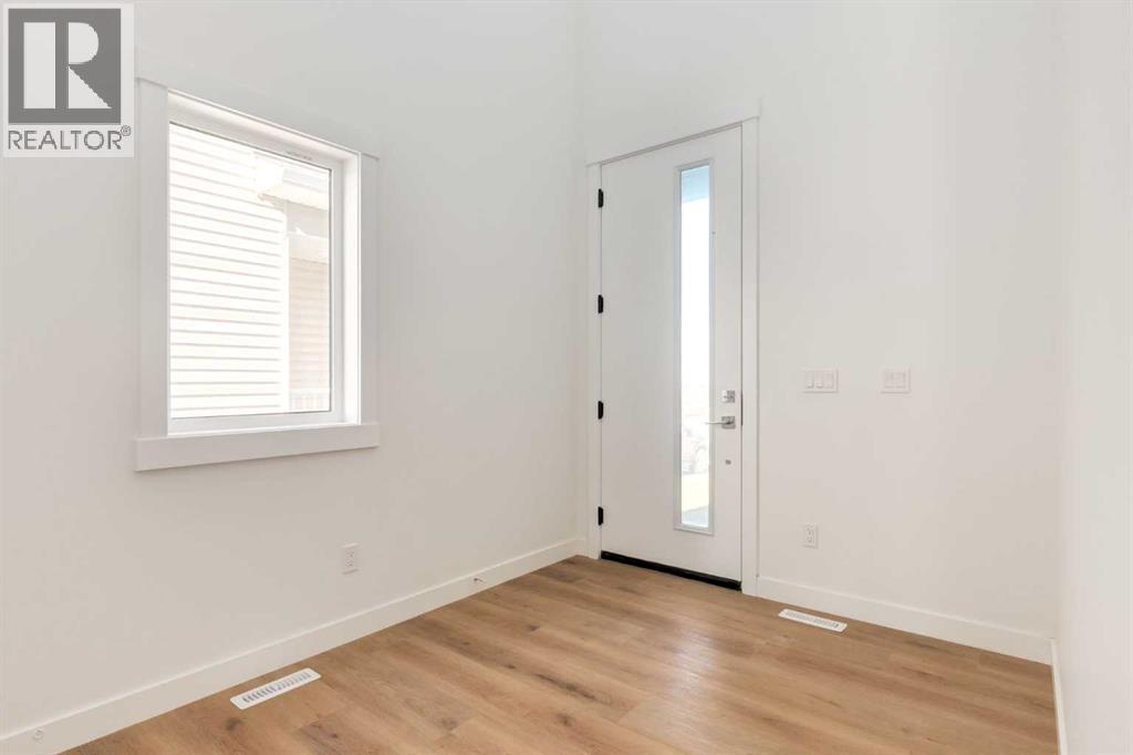 1173 Iron Ridge Avenue, Crossfield, Alberta  T0M 0S0 - Photo 3 - A2262319