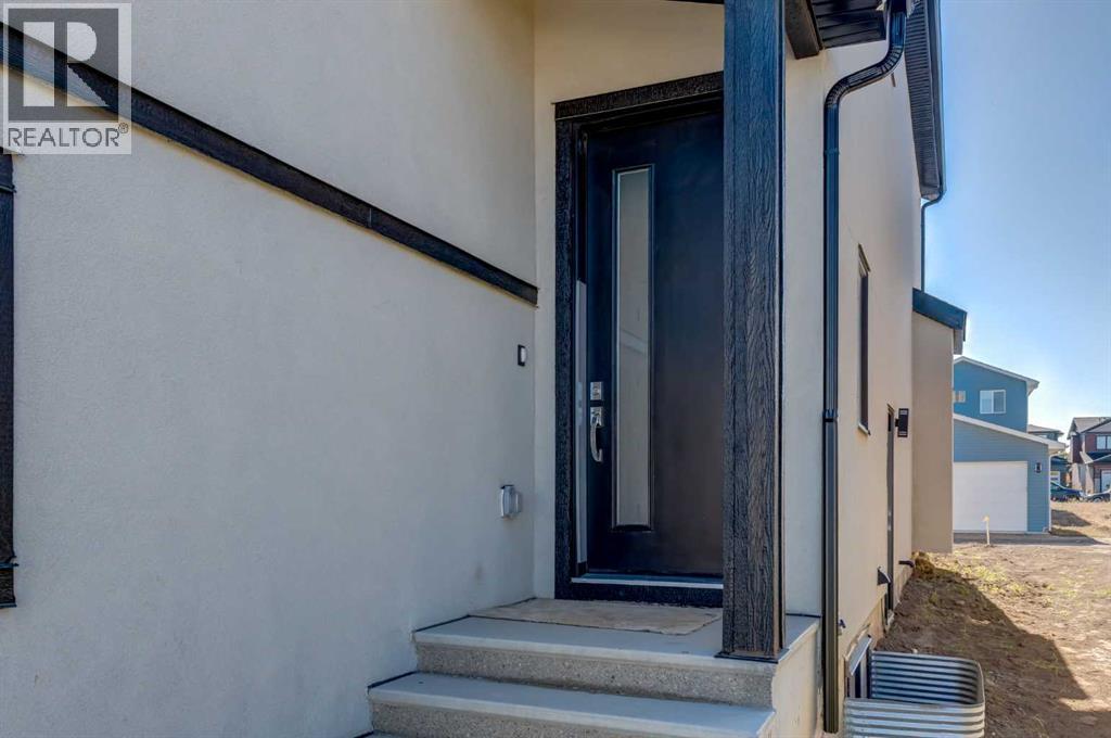 1173 Iron Ridge Avenue, Crossfield, Alberta  T0M 0S0 - Photo 2 - A2262319