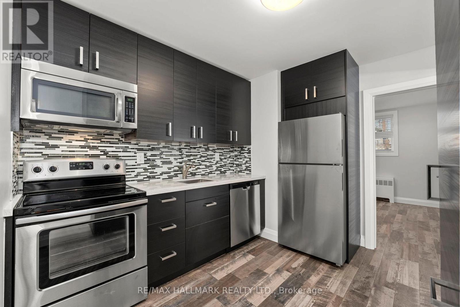 Unit 2 - 276 King Edward Avenue, Toronto, Ontario  M4C 0A8 - Photo 2 - E12518894