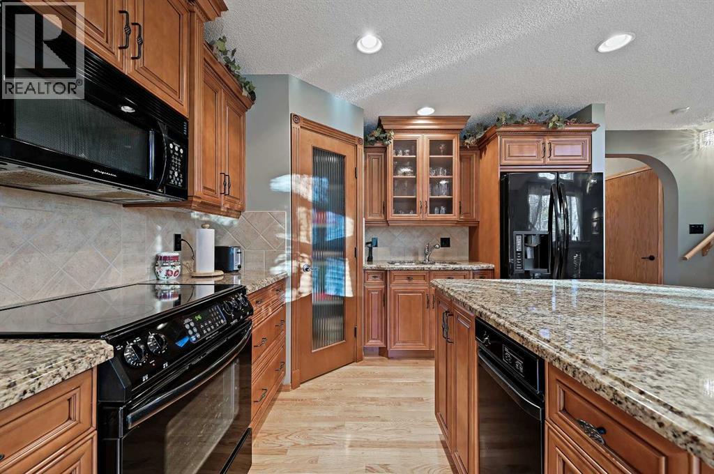 114 Valley Ponds Crescent Nw, Calgary, Alberta  T3B 5T7 - Photo 16 - A2268163