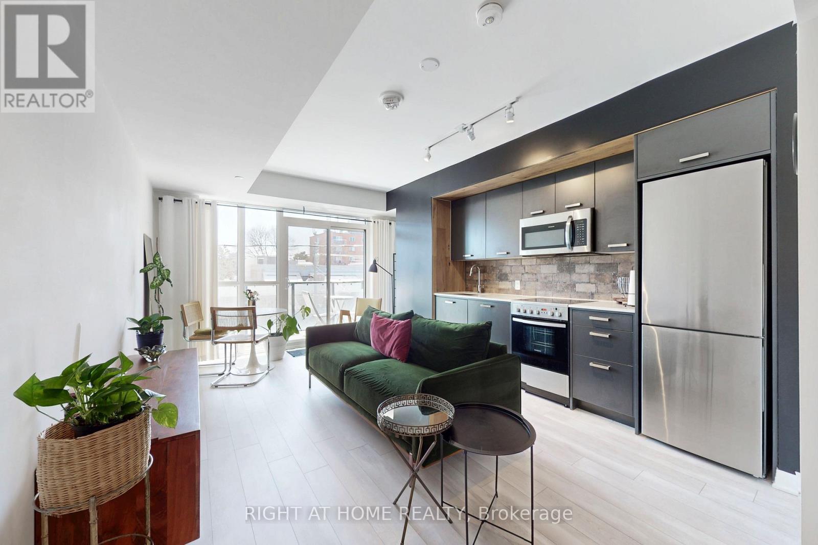 202 - 1630 Queen Street E, Toronto, Ontario M4L 0B3 - Photo 1 - E12477656