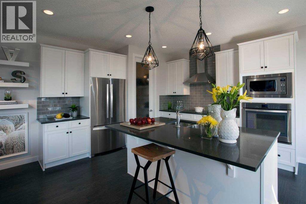 51 Sunrise Heath, Cochrane, Alberta  T4C 3C5 - Photo 4 - A2256885