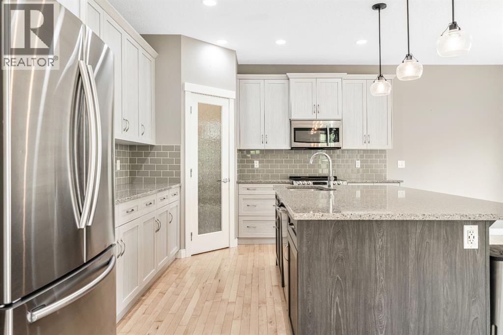 21 Riviera Bay, Cochrane, Alberta  T4C 0Y6 - Photo 8 - A2253125