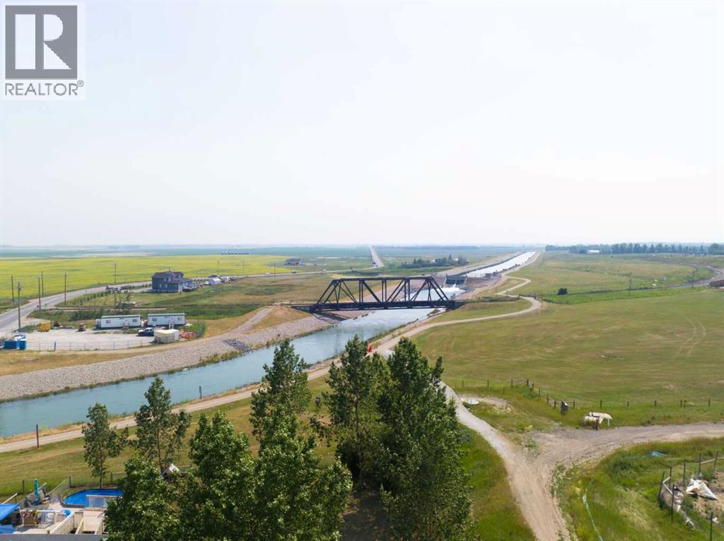 240187 Rainbow Road, Chestermere, Alberta  T1X 0M8 - Photo 5 - A2261473