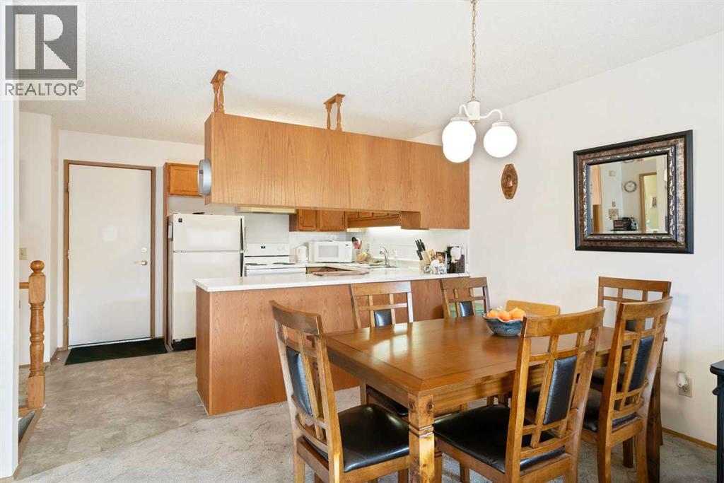 40 Sandarac Circle Nw, Calgary, Alberta  T3K 3V6 - Photo 6 - A2269204