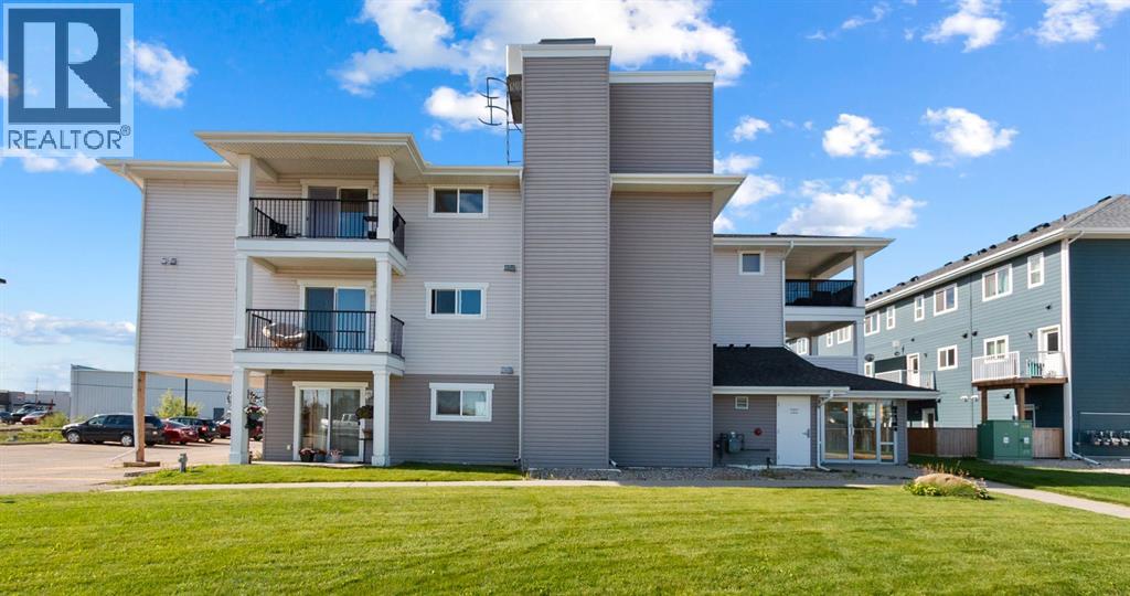 304, 1021 Ross Street, Crossfield, Alberta  T0M 0S0 - Photo 1 - A2247339
