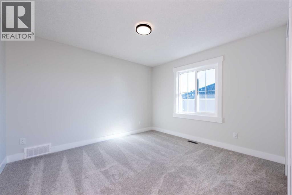 22 Cimarron Estates Gate, Okotoks, Alberta  T1S 0M9 - Photo 34 - A2268074