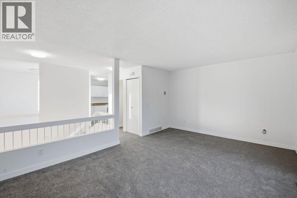 121 Powell Street, Cochrane, Alberta  T4C 1Z4 - Photo 14 - A2266239