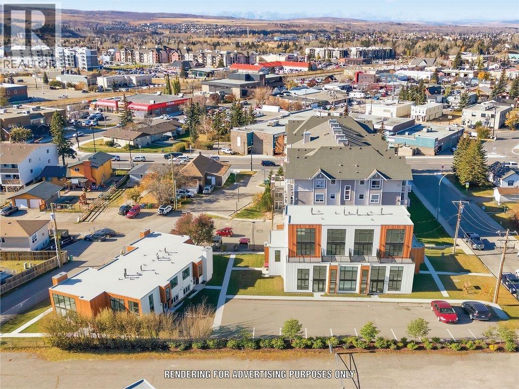 121 Powell Street, Cochrane, Alberta  T4C 1Z4 - Photo 4 - A2266239