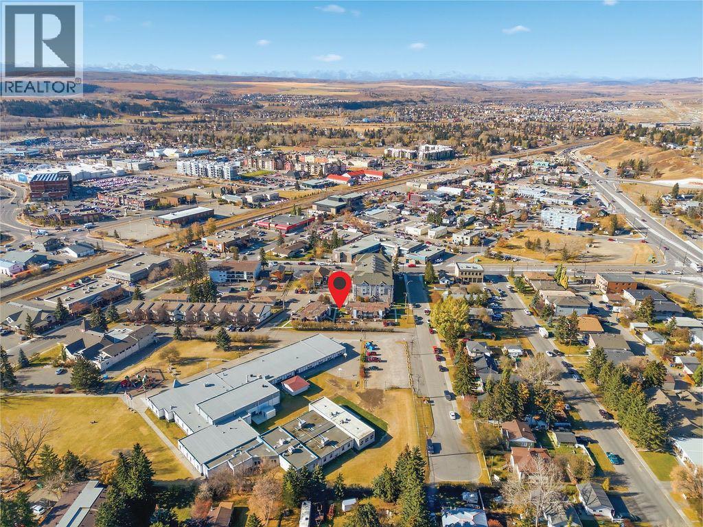 121 Powell Street, Cochrane, Alberta  T4C 1Z4 - Photo 47 - A2266239