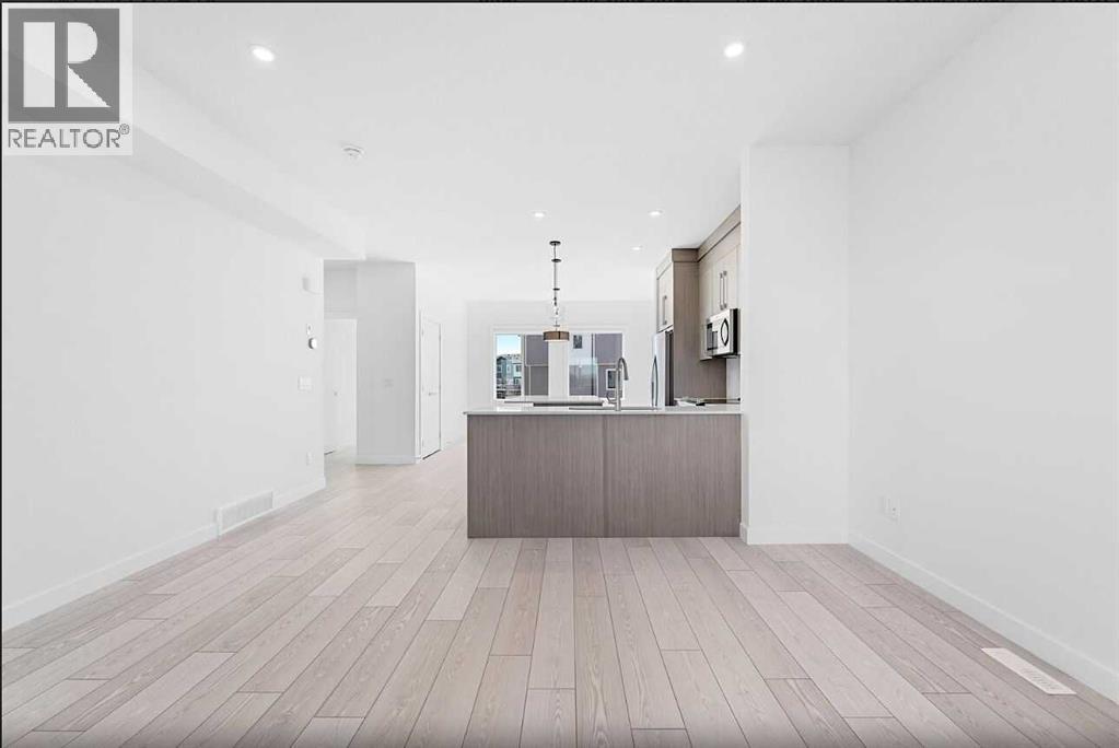 703, 280 Chelsea Road, Chestermere, Alberta  T1X 2X9 - Photo 7 - A2260933