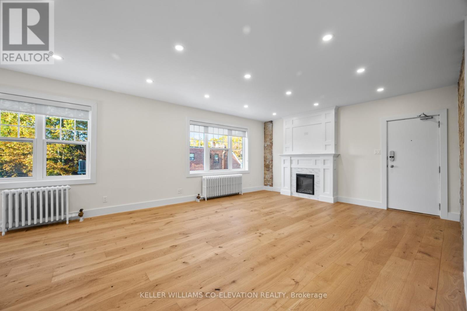 4 - 2461 Queen Street E, Toronto, Ontario  M4E 1H8 - Photo 1 - E12519924