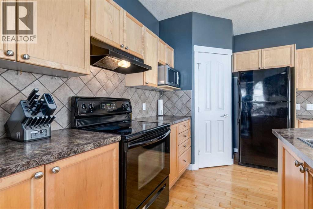 35 Bridlecrest Manor Sw, Calgary, Alberta  T2Y 4Y4 - Photo 9 - A2250180