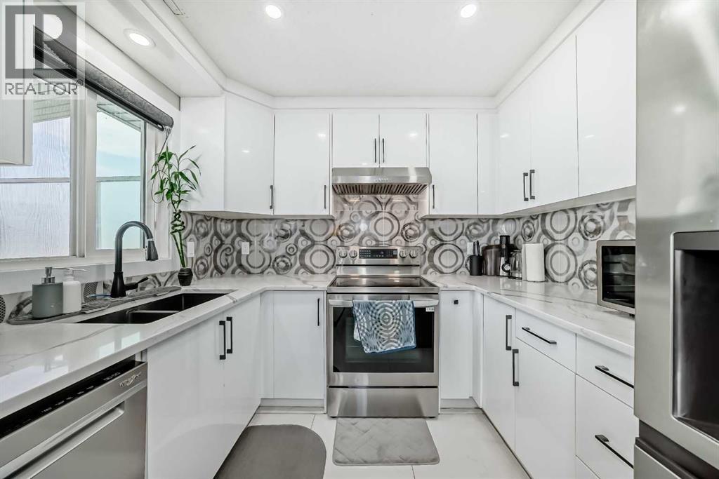 49 Taravista Way Ne, Calgary, Alberta  T3J 4K1 - Photo 2 - A2256950